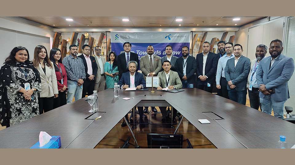Grameenphone signs agreement with Standard Chartered Bank