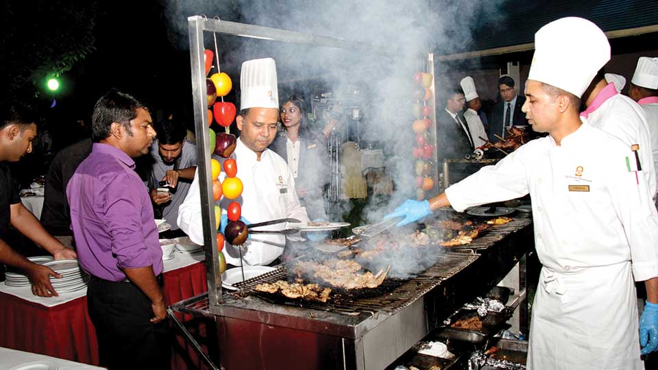 Enjoy poolside BBQ buffet with live music at Pan Pacific Sonargaon